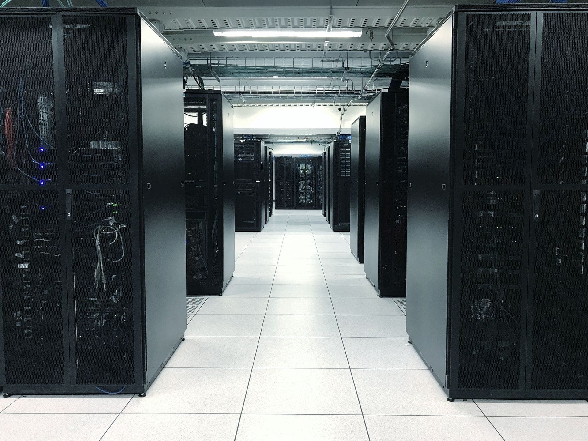 Rows of server racks inside a data center