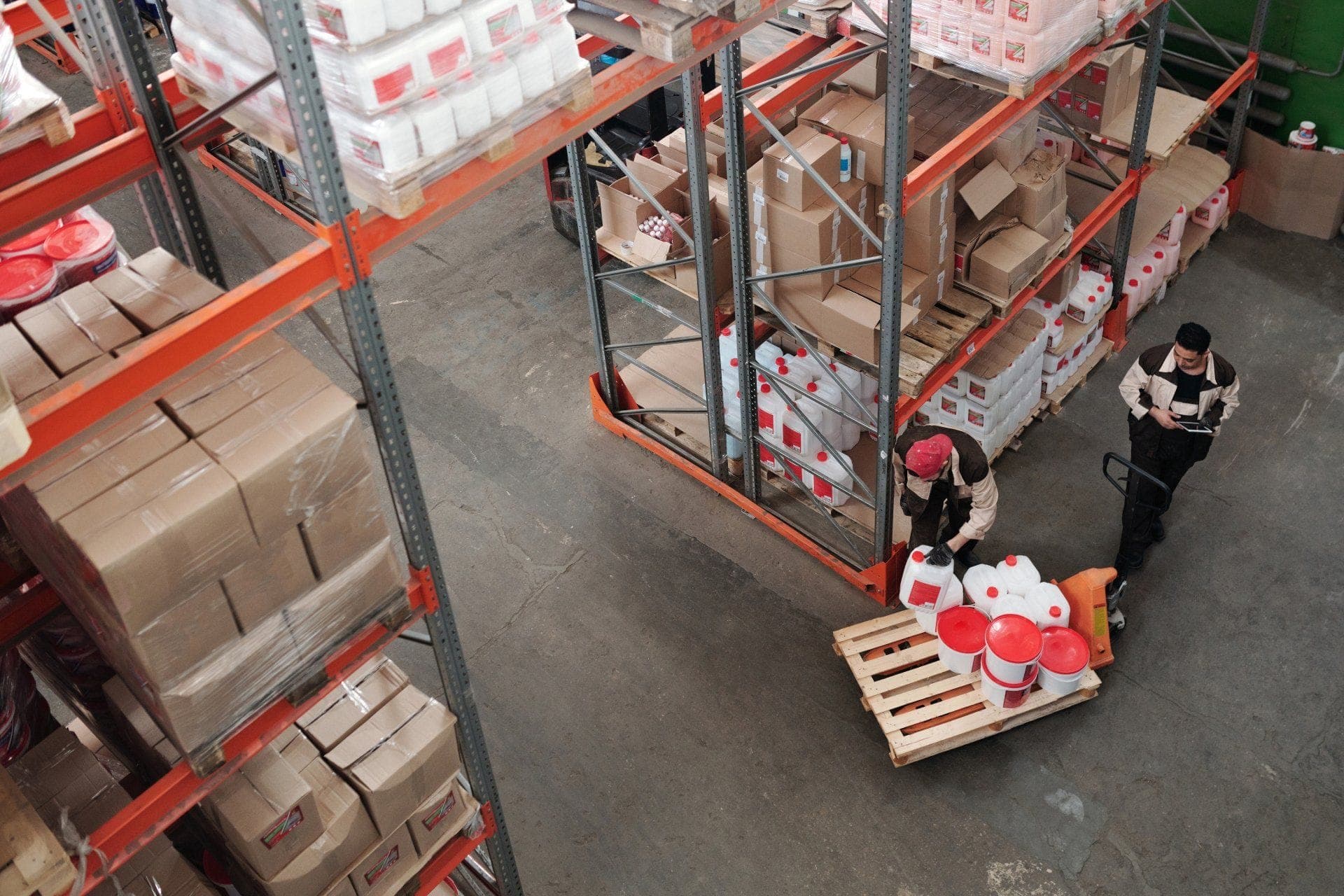 Warehouse pallet racking stocked with palletized goods